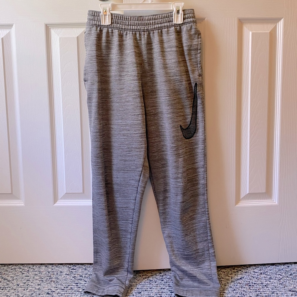 Grey Nike sweatpants